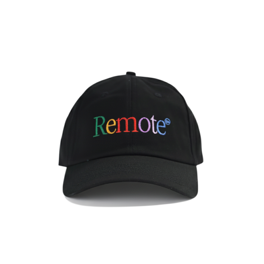 Black embroidered nylon “Remote” dad hat with multicolor lettering on a white background